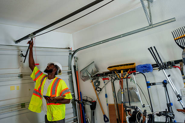 Professional Garage Door Panel Replacement technician working in Hamlet, IN